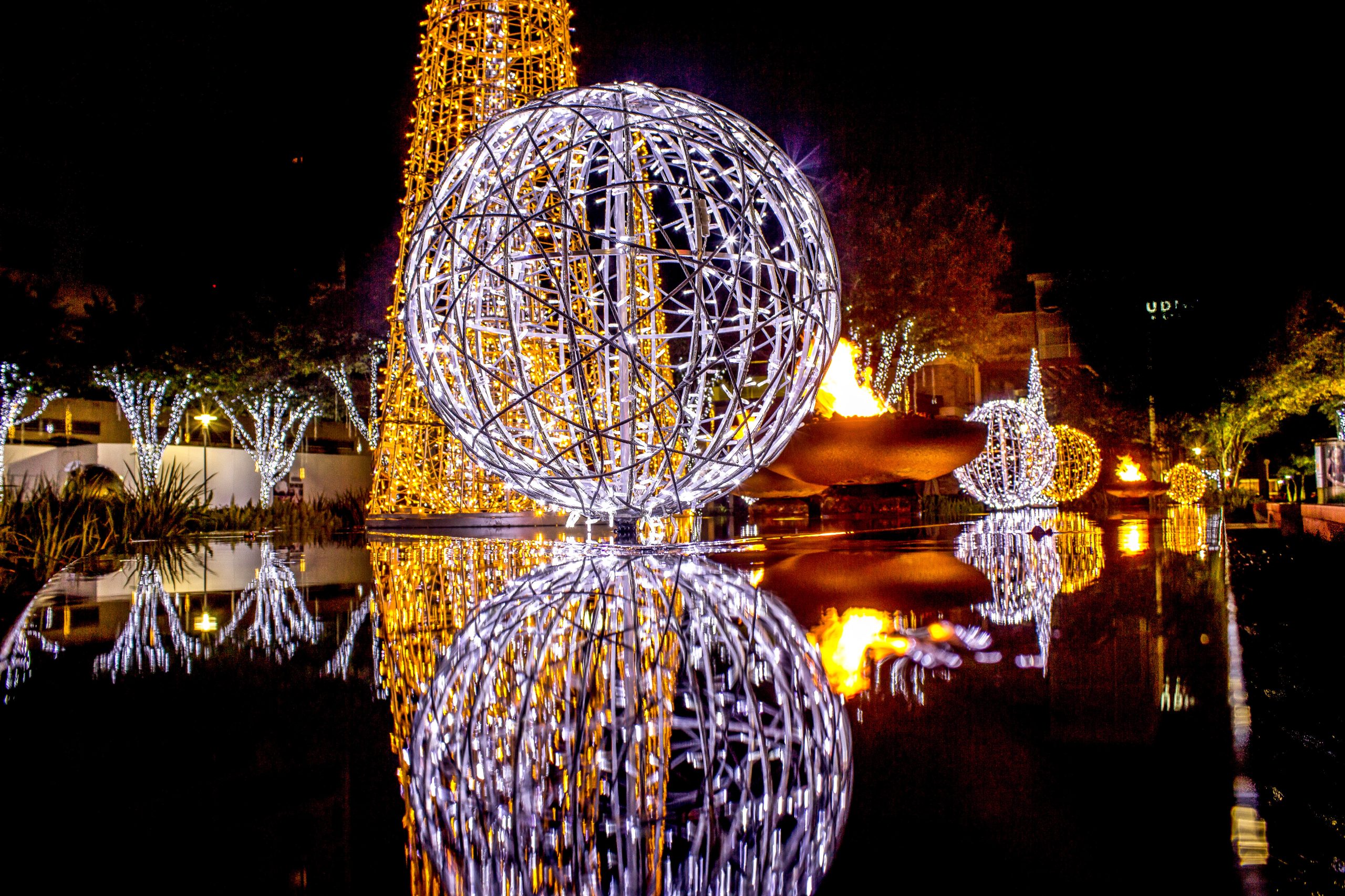 Christmas light display with a giant orb--you'll find impressive displays like this all over the best places to celebrate Christmas in Texas