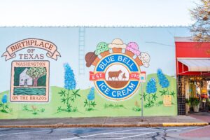 murals on the side of a building, one of the best things to see in brenham texas