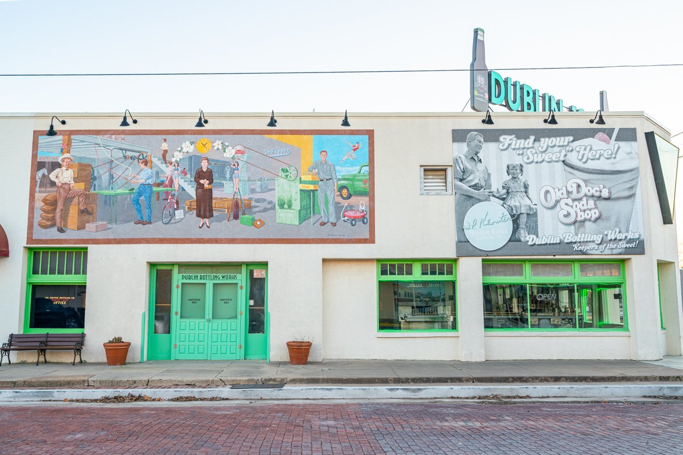 the side of dublin bottling works with murals visible, one of the best things to do in dublin texas