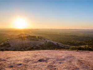 sunrise over enchanted rock texas as viewed after completing the summit trail enchanted rock hike