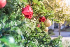 red and gold ornaments on a christmas in dallas tree
